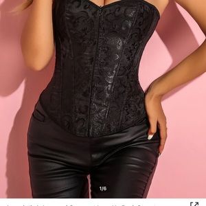 Size L (probably an 8) brand new lingerie and bustier.